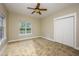 Neutral bedroom with carpet, windows, closet, and ceiling fan at 114 Grand Palm Ln, Summerville, SC 29485