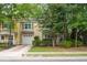 Charming two-story townhouse with an attached garage and well-manicured front yard at 114 Grand Palm Ln, Summerville, SC 29485