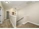 Hallway with carpet and stairs leading to another floor at 114 Grand Palm Ln, Summerville, SC 29485