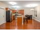 Open kitchen features granite countertops, stainless appliances, and an island with seating at 114 Grand Palm Ln, Summerville, SC 29485
