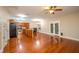 A bright open floor plan with an airy living room connected to the kitchen and dining area at 114 Grand Palm Ln, Summerville, SC 29485