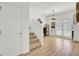 Bright entryway with stairs and french doors to the backyard at 117 Red Leaf Blvd, Moncks Corner, SC 29461