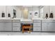 Bathroom featuring a double vanity with gray cabinets, white countertops, and modern fixtures at 120 E Respite Ln, Summerville, SC 29483