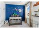 This charming Bedroom features an outer space theme, adorable decor, and a window at 120 E Respite Ln, Summerville, SC 29483