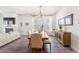 Elegant dining room featuring a large wooden table, stylish chairs, and a buffet at 120 E Respite Ln, Summerville, SC 29483