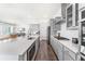 Gourmet kitchen view showcases eat-in island and stainless steel appliances at 120 E Respite Ln, Summerville, SC 29483