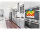 Kitchen view featuring stainless appliances, quartz counters and white backsplash at 120 E Respite Ln, Summerville, SC 29483
