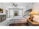 Bright bedroom features paneled wall, neutral walls, and large windows providing natural light at 120 E Respite Ln, Summerville, SC 29483