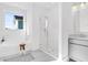 Bright bathroom features a tub, glass shower, vanity with sink, and a stool at 1219 Homecoming Blvd # Cc1-27, Ravenel, SC 29470