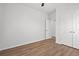 Spacious bedroom featuring wood-look flooring, neutral paint and closet space with double doors at 1302 Paint Horse Ct, Mount Pleasant, SC 29429
