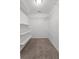 Walk-in closet featuring carpet, wire shelving and overhead light at 1302 Paint Horse Ct, Mount Pleasant, SC 29429