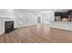Spacious living room with fireplace, stainless appliances, and plenty of natural light at 1302 Paint Horse Ct, Mount Pleasant, SC 29429