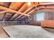 Spacious attic with exposed wood beams, ample storage, and a cozy atmosphere at 131 Wedgewood Cir, Goose Creek, SC 29445
