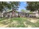 Spacious backyard showing swing set and partial brick exterior at 131 Wedgewood Cir, Goose Creek, SC 29445