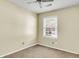 This bedroom features a window for natural light and a ceiling fan at 131 Wedgewood Cir, Goose Creek, SC 29445