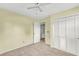 Standard bedroom with a ceiling fan, closet, and an attached bathroom at 131 Wedgewood Cir, Goose Creek, SC 29445