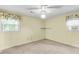 Bedroom with two windows and neutral colored walls; perfect for customization at 131 Wedgewood Cir, Goose Creek, SC 29445