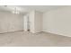 A bright dining room with carpet, a chandelier, and a view into the kitchen space at 131 Wedgewood Cir, Goose Creek, SC 29445