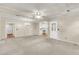 The space showcases worn carpeting, a ceiling fan, and access to other areas at 131 Wedgewood Cir, Goose Creek, SC 29445