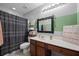 This full bathroom includes a modern vanity, framed mirror, and shower-tub combination at 135 Gaslight Blvd, Summerville, SC 29483