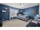 This bedroom features a ceiling fan, carpeted floors and large window at 135 Gaslight Blvd, Summerville, SC 29483