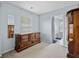 This dressing room features a built-in mirror, and adjoins the ensuite bathroom at 135 Gaslight Blvd, Summerville, SC 29483