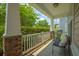 Inviting front porch with stylish seating and views of a lush, green landscape at 135 Gaslight Blvd, Summerville, SC 29483