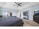 Spacious main bedroom featuring neutral carpet, ceiling fan, and ensuite bathroom entrance at 135 Gaslight Blvd, Summerville, SC 29483