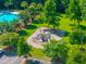 This colorful playground and nearby swimming pool are set among well-maintained grassy areas and mature trees at 135 Gaslight Blvd, Summerville, SC 29483