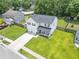 Aerial view of a home showing the spacious lawn, two car garage, and proximity to neighborhood amenities at 1350 Pinyon Pine Dr, Ladson, SC 29456
