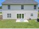 Backyard view of home featuring a patio, grill, and well-maintained lawn at 1350 Pinyon Pine Dr, Ladson, SC 29456