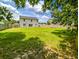 Expansive backyard featuring a well-maintained lawn and a sturdy wooden fence for privacy at 1350 Pinyon Pine Dr, Ladson, SC 29456