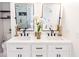 Bathroom featuring a dual vanity, a soaking tub, and a glass-enclosed shower with marble surround at 1350 Pinyon Pine Dr, Ladson, SC 29456