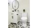 Well-lit bathroom featuring a modern vanity, toilet, and decorative tile flooring at 1350 Pinyon Pine Dr, Ladson, SC 29456