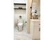 Contemporary bathroom featuring a modern vanity and toilet with marble floors and shelving at 1350 Pinyon Pine Dr, Ladson, SC 29456