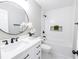 Modern bathroom featuring white subway tile, sleek fixtures, and a marble-look floor at 1350 Pinyon Pine Dr, Ladson, SC 29456