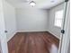 Bright bedroom with hardwood floors, a ceiling light, and a window with natural light at 1350 Pinyon Pine Dr, Ladson, SC 29456
