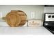 Stylish countertop featuring wooden serving trays and a rustic decorative sign at 1350 Pinyon Pine Dr, Ladson, SC 29456