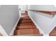 Classic wood staircase leading to the upper level of the home at 1350 Pinyon Pine Dr, Ladson, SC 29456