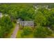 Aerial view of a home showcasing its lush surroundings, well-maintained landscaping, and private setting at 138 Shadowmoss Pkwy, Charleston, SC 29414