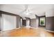Large bedroom with hardwood floors, light brown walls, and closet at 138 Shadowmoss Pkwy, Charleston, SC 29414