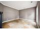 Upstairs room featuring neutral paint, base-molding, and tile flooring perfect for an office or spare room at 138 Shadowmoss Pkwy, Charleston, SC 29414