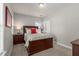Bedroom showcasing a wooden bed frame, carpet, and traditional decor at 1417 Roustabout Way, Charleston, SC 29414
