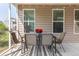 Relaxing screened porch with a dining table and chairs, perfect for enjoying outdoor meals at 1417 Roustabout Way, Charleston, SC 29414