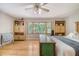 Bright bedroom with built-in storage, large windows providing natural light and backyard view at 150 Riverbend Ln, Ridgeville, SC 29472
