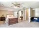 Spacious carpeted bedroom with ceiling fan and plenty of natural light at 150 Riverbend Ln, Ridgeville, SC 29472