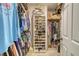 Walk-in closet with custom shelving and organization system at 150 Riverbend Ln, Ridgeville, SC 29472