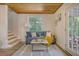 Cozy living room with comfortable sofa, rug, small table and stairs to a higher floor at 150 Riverbend Ln, Ridgeville, SC 29472