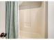 Clean shower with tiled walls and a patterned shower curtain at 150 Riverbend Ln, Ridgeville, SC 29472