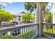 Balcony view overlooking the parking area and nearby apartment buildings, showcasing community living at 1600 Long Grove Dr # 1115, Mount Pleasant, SC 29464